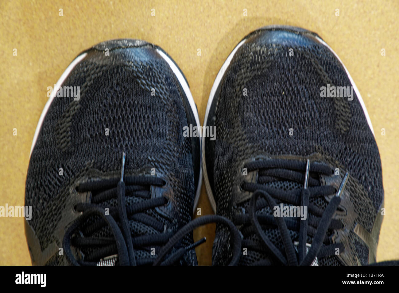 Black sneakers running shoes. Close up of men sport shoes Stock Photo