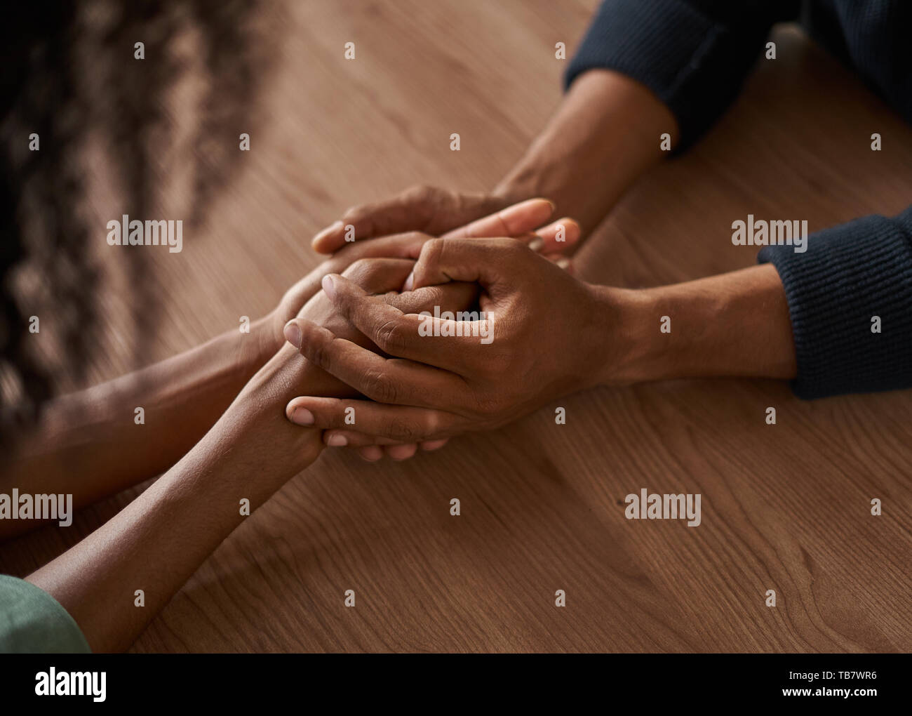 Holding up high hi-res stock photography and images - Alamy