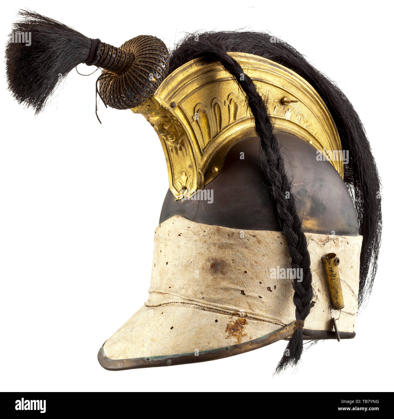 A very rare French 1st Empire Dragoon officer's helmet from the Hanoverian Royal Collection, circa 1810 - 1815, With copper skull retaining its original animal skin turban also extended to cover the leather peak (the original leopard fur now missing), fitted with gilt-brass crest decorated with Neo-classical ornament cast in low relief and including a Gorgon mask at the front, retaining much of its original black horsehair crest and frontal plume, the latter on its original base ornamented with patterned gilt wire and sequins, fitted with gilt-br, Additional-Rights-Clearance-Info-Not-Available Stock Photo