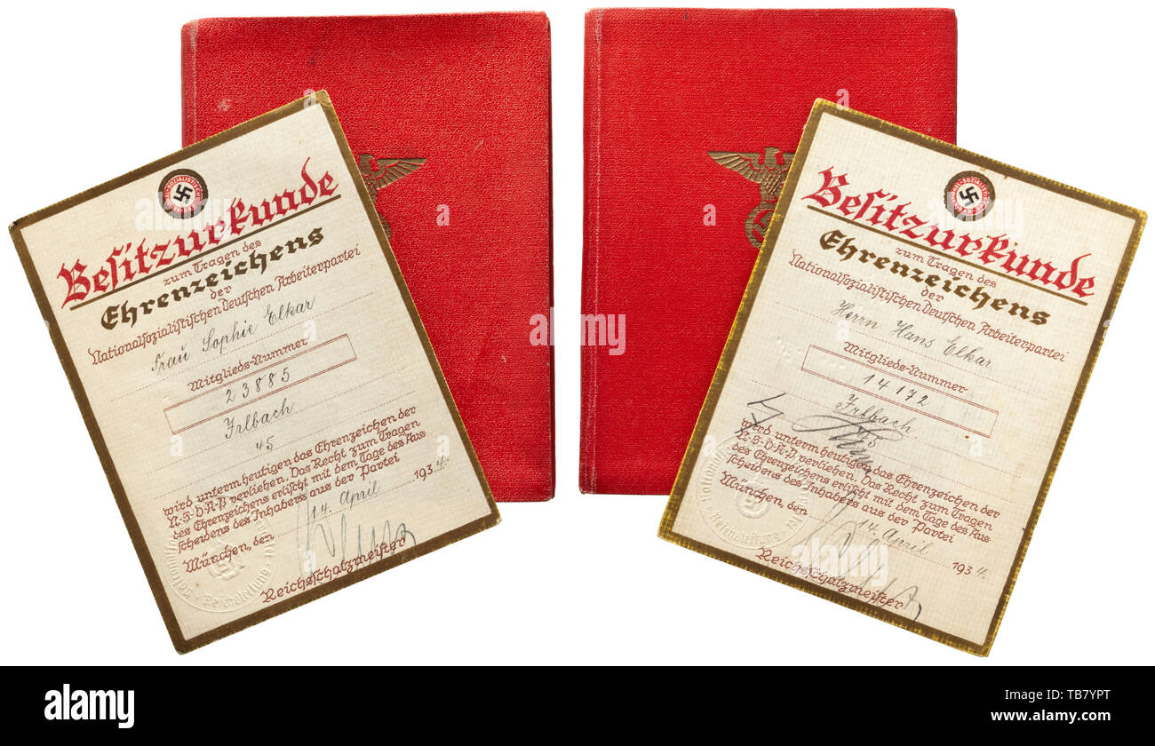 NSDAP party membership books and possession documents for the Golden Party Badge of the married couple Sophie and Hans Elkar, Party membership book for the department manager Johann Elkar in Berlin-Frohnau from Erlangen with acceptance date '8. August 1925' and membership number '14172' with photograph and stamped signature of Hitler. Included is the possession document for the Badge of Honour of the NSDAP (Golden Party Badge) number '14172' dated 14 April 1934 with signature of the treasurer Franz Xaver Schwarz (1875 - 1947) and original signature of Hitler (presumably req, Editorial-Use-Only Stock Photo