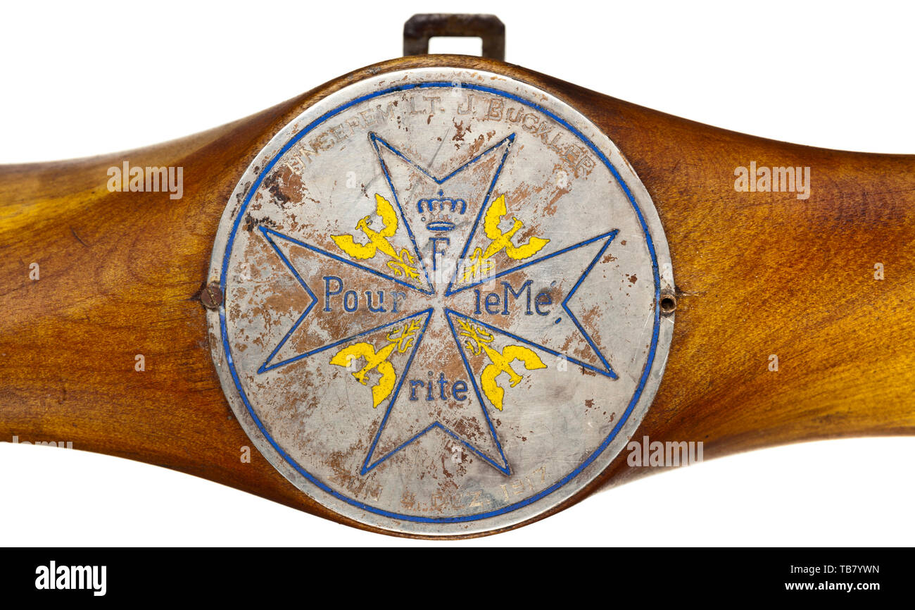Leutnant Julius Buckler (1893 - 1960) - a gift of honour on the occasion of conferring the order 'Pour le Mérite', In the form of a laminated walnut wall propeller with applied plaque (silver-plated non-ferrous metal), on it stylised Pour le Mérite (engraved and enamelled) and dedication 'Unserem Lt. J. Buckler zum 4. Dez. 1917'. Width 62 cm. Buckler was awarded the P.L.M. for his 30th air victory on 4 December 1917. He was a member of Jasta 17, before his promotion to lieutenant he had been awarded amongst others the Military Merit Cross in Gold. During WW I Buckler was wo, Editorial-Use-Only Stock Photo