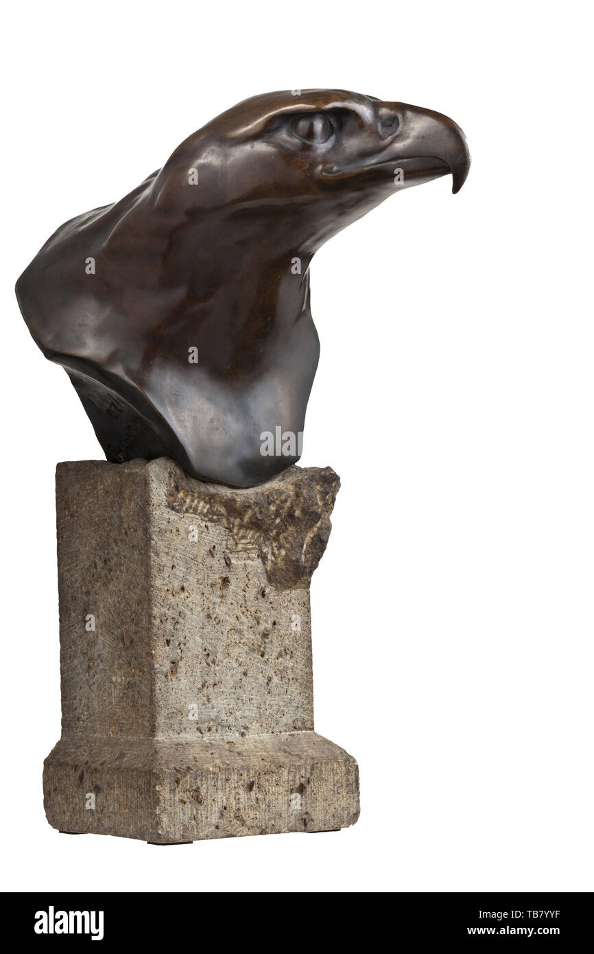 A statue of an eagle, Bronze, hollow cast, brown patina, signed by the artist at the bottom left and dated 'Vordermag 1920'. Mounted on a grey stone pedestal (chipped). Height circa 40 cm. A very prestigious sculpture. historic, historical 20th century, Editorial-Use-Only Stock Photo