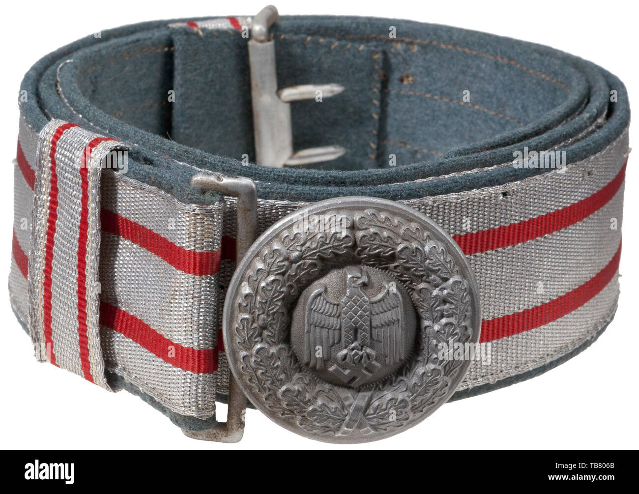 THE JOHN WAHL BELT AND BUCKLE COLLECTION, An Army Band Leader Brocade Belt and Buckle, Stamped aluminium 50 mm diameter round buckle, burnished finish, reverse unmarked. 45 mm field-grey wool backed aluminium/silver woven brocade with two red stripes and two sliding, vertical 22 mm matching keepers. Reverse exhibits significant mothing. Missing leather size adjustment tongue. Aluminium catch present. Length 110 cm., Additional-Rights-Clearance-Info-Not-Available Stock Photo