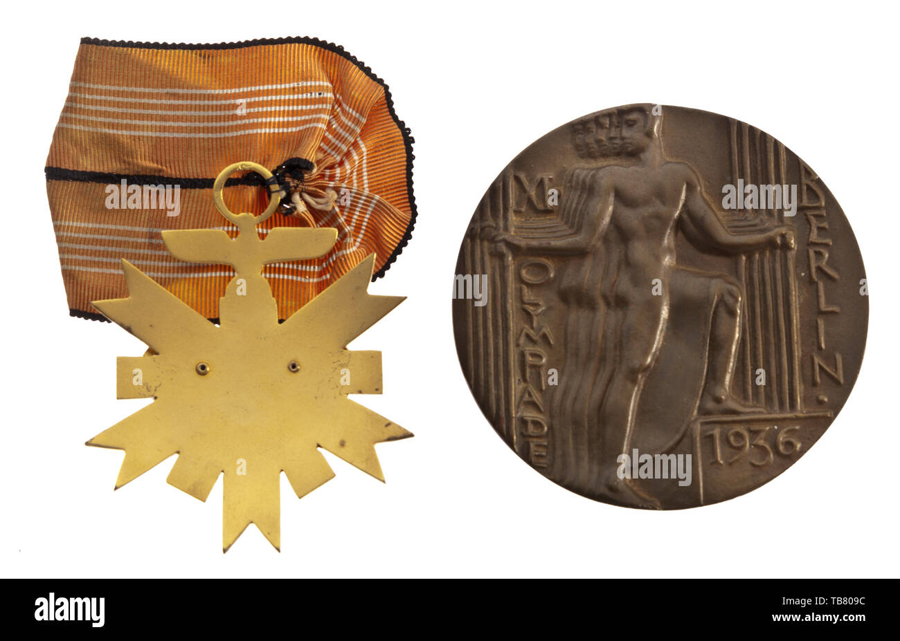 Four objects commemorating the Olympic Games 1936, A German Olympic Decoration, 2nd Class, on ribbon. Includes a relief plaque in bronze by Otto Placzek, inscribed 'XI. Olympiade Berlin 1936' on the front, the Olympic bell and the artist's signature on the back, in a red leather, gold-embossed presentation case (diameter circa 7.5 cm). Comes with a stand (black plastic) with inlaid bronze medal, inscribed 'Zur Ehre des Vaterlandes / zum Ruhme des Sports' (tr. For the honour of our country and for the glory of sport) on the front, the Olympic bell on the back (total height 7, Editorial-Use-Only Stock Photo