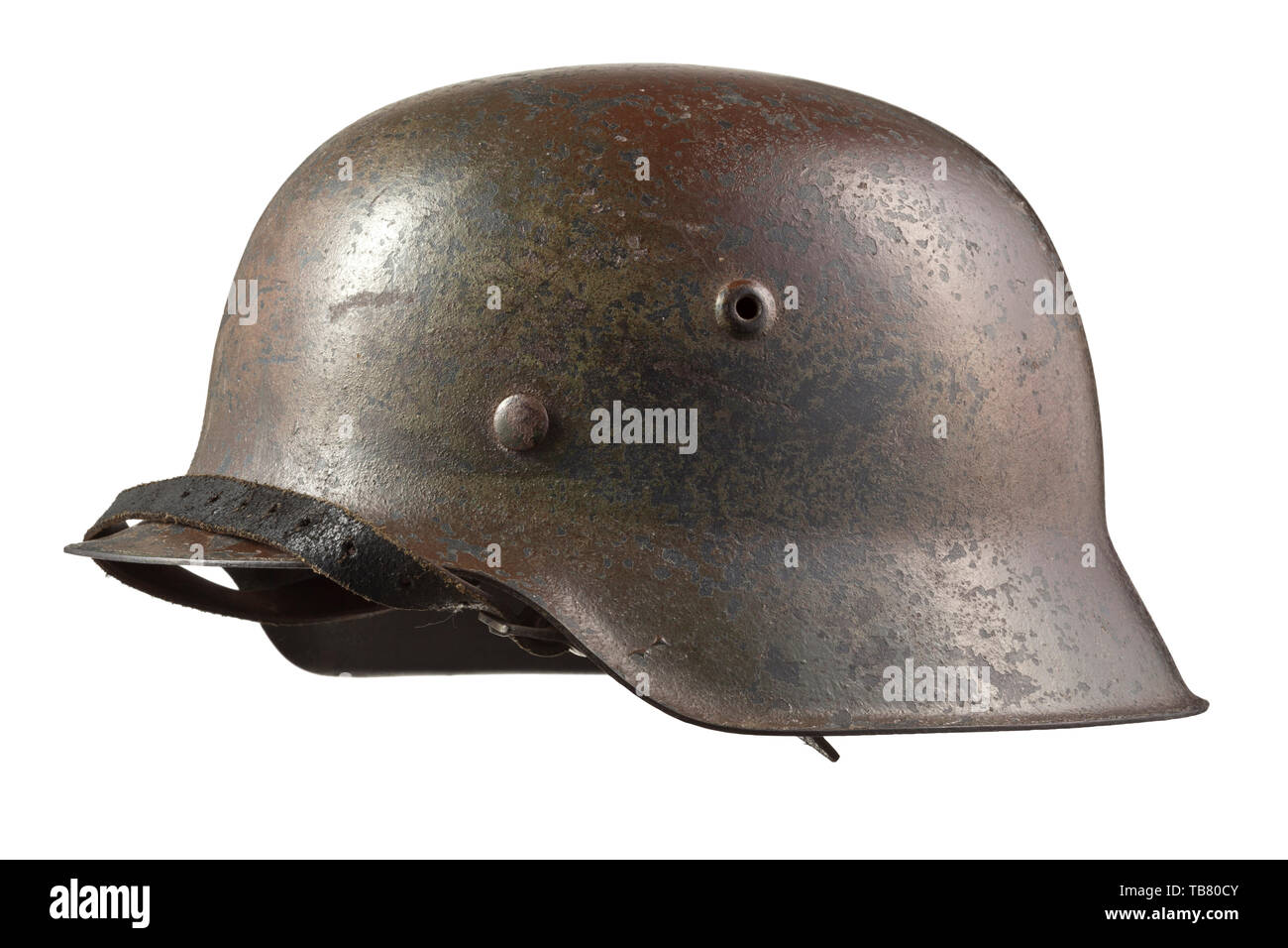 A steel helmet M 42 in 'Normandy' camouflage, The skull with maker's stamping 'hkp64' (tr. Saxon Enamel and Sheet Metal Factory), multi-coloured camouflage paint applied over the original field-grey paint. The inner liner (with chinstrap) and skull with handwritten wearer designation 'Köhler'. historic, historical 20th century, Editorial-Use-Only Stock Photo