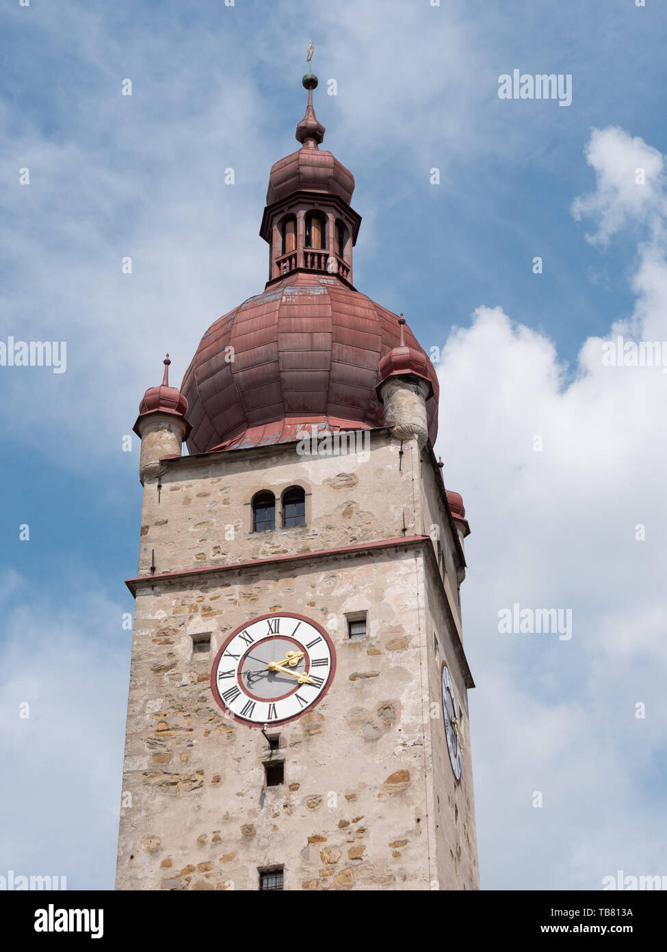 City Tower of Waidhofen an der Ybbs, called Stadtturm in German, with Stone Facade, Red Roof, Clock and Blue Sky Stock Photo