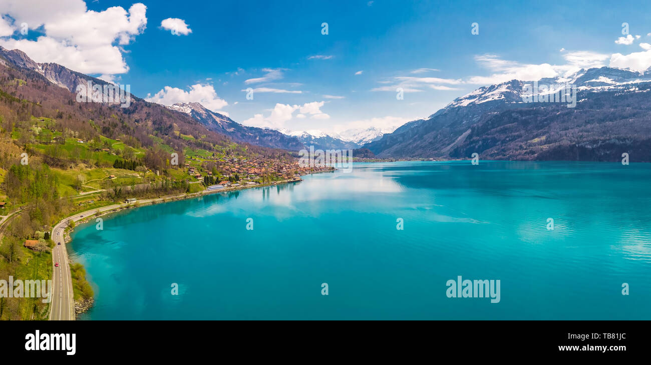 Brienz town on lake Brienz by Interlaken with the Swiss Alps covered by snow in the background, Switzerland, Europe Stock Photo