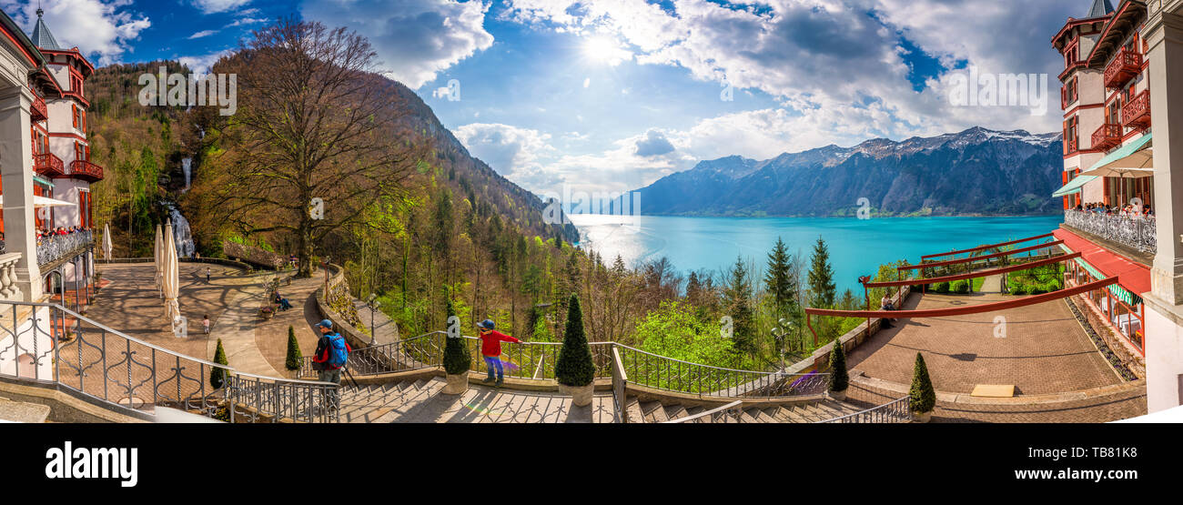 BRIENZ, April 21, 2019 - Lake Brienz wir Giessbach woterfall by Interlaken with the Swiss Alps covered by snow in the background, Switzerland, Europe Stock Photo