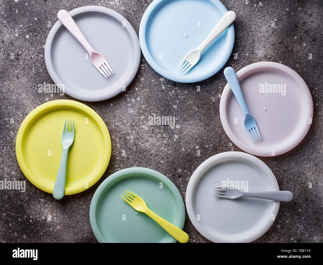 Colorful plastic dishes for summer picnic Stock Photo Alamy
