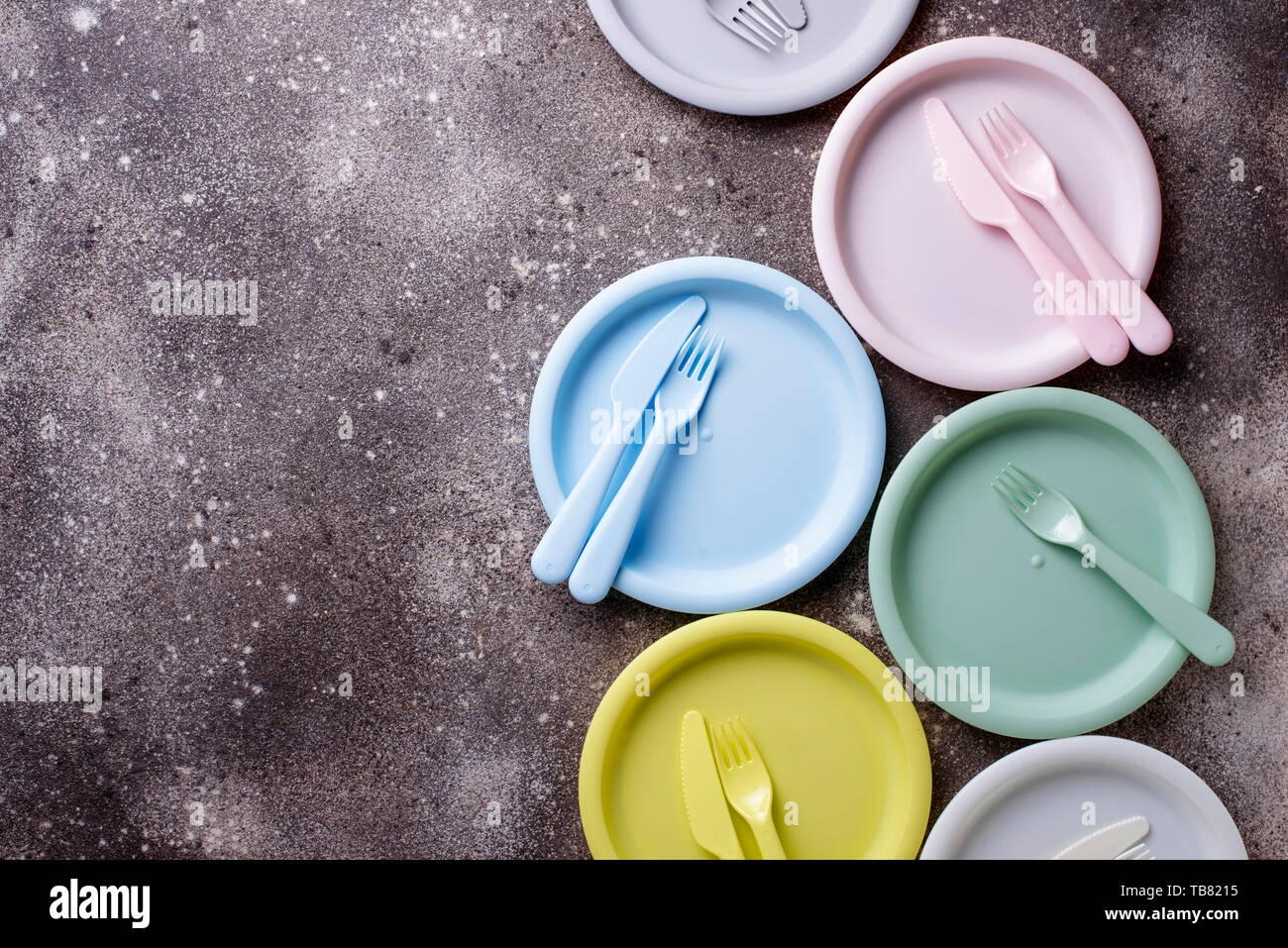 Colorful plastic dishes for summer picnic Stock Photo Alamy