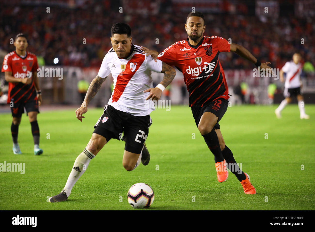 Buenos Aires, Argentina - May 30, 2019: Enzo Perez(River) and Renan Lodi (Paranaense) fighting the possesion of the ball for the finals of the Conmebo Stock Photo