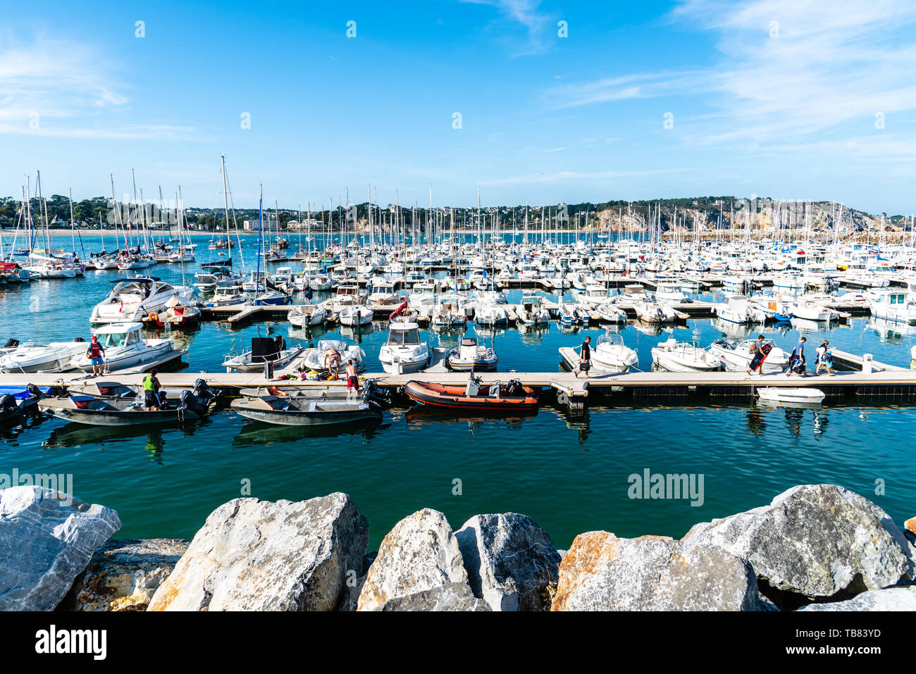 Morgat, France - August 4, 2018:  The marina of Morgat a sunny day of summer with many smalls boats aligned in the piers Stock Photo