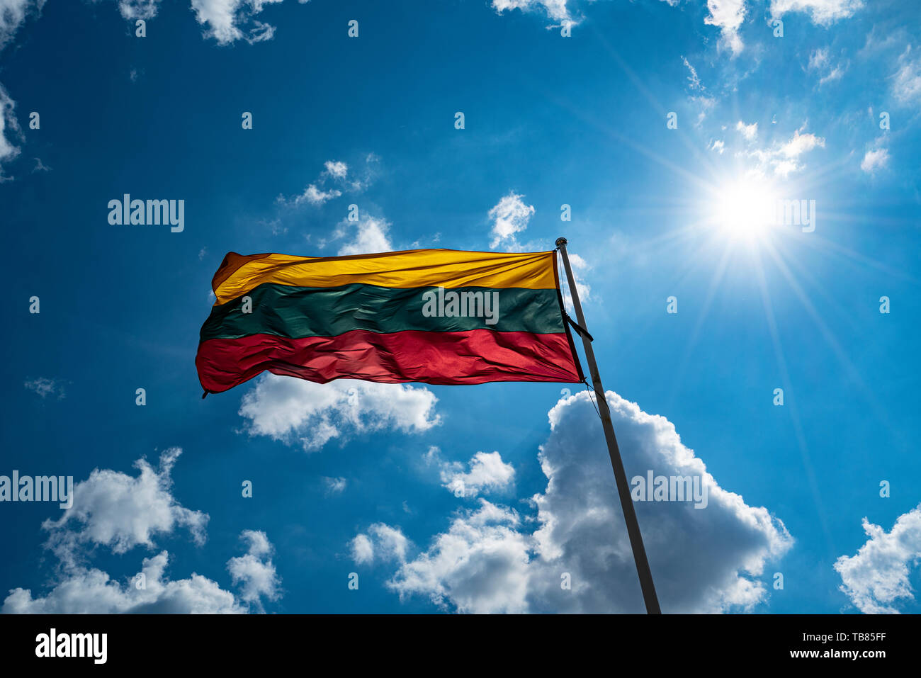 Vilnius, Lithuania. May 2019.   Lithuanian flag waving in the sky Stock Photo