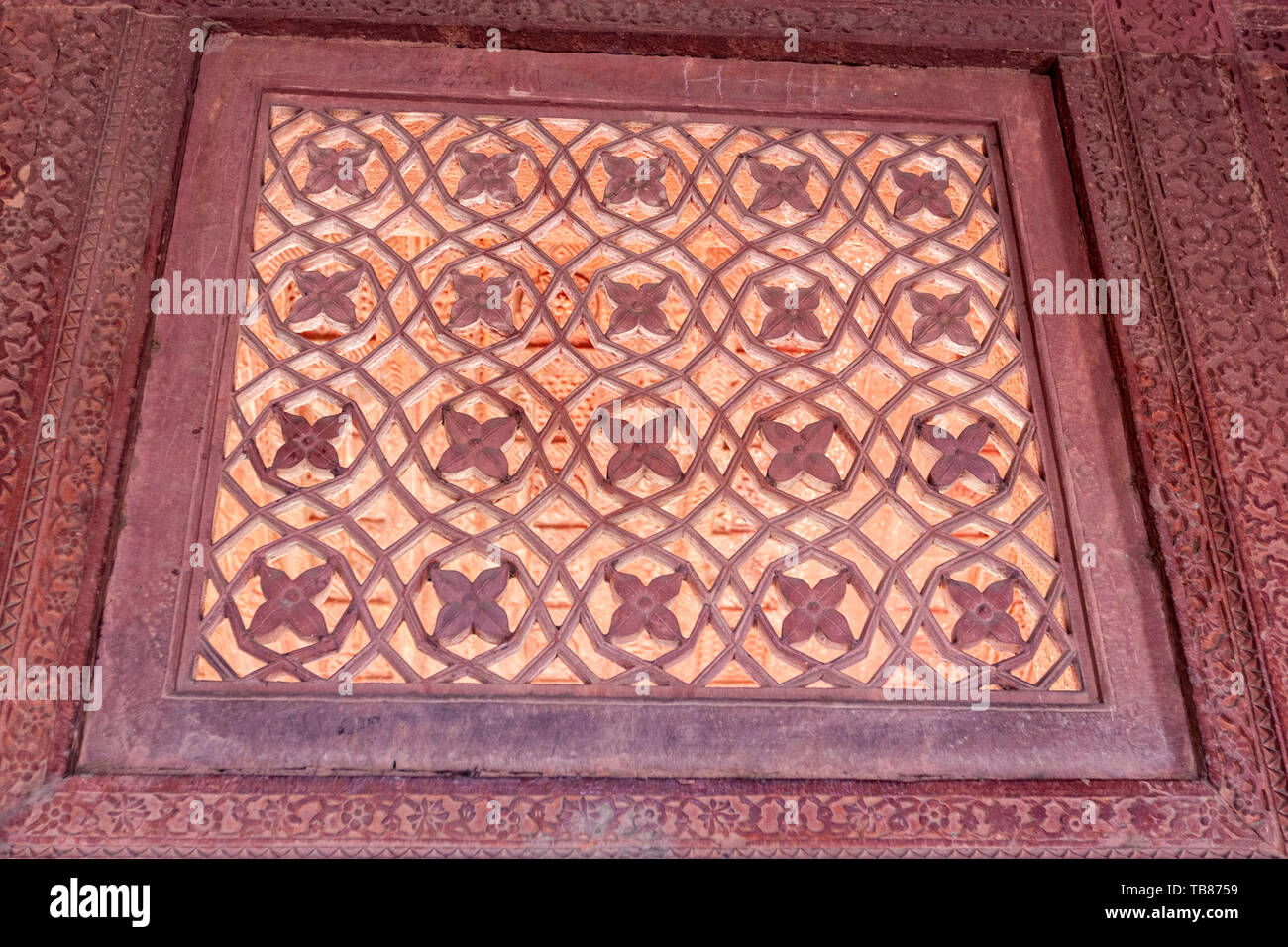 Red sandstone Lattice Window, Fatehpur Sikri, Agra District of Uttar Pradesh, India. Stock Photo
