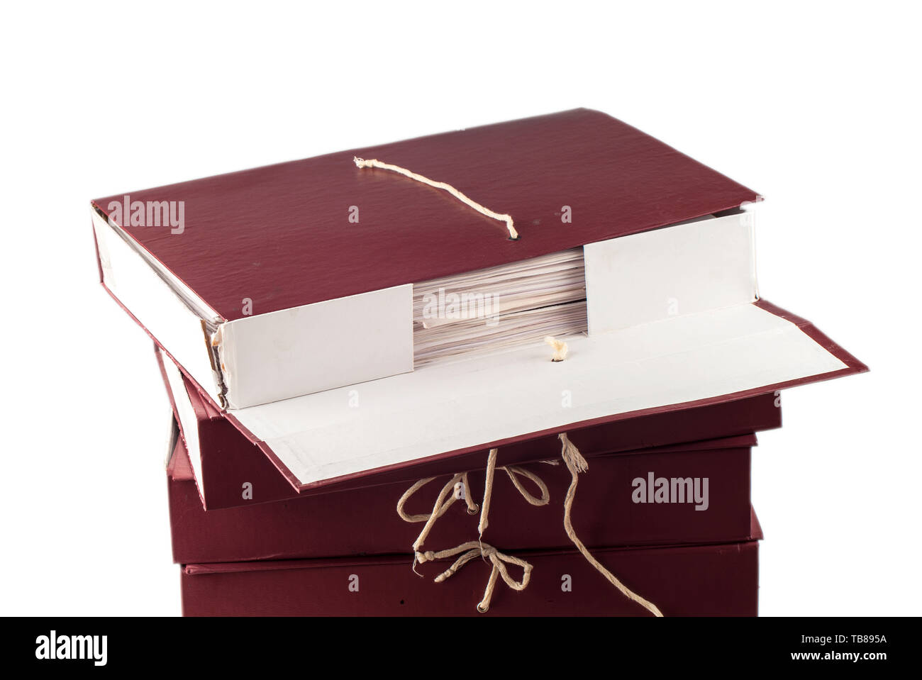 Paper documents stacked in archive isolated on white background Stock Photo
