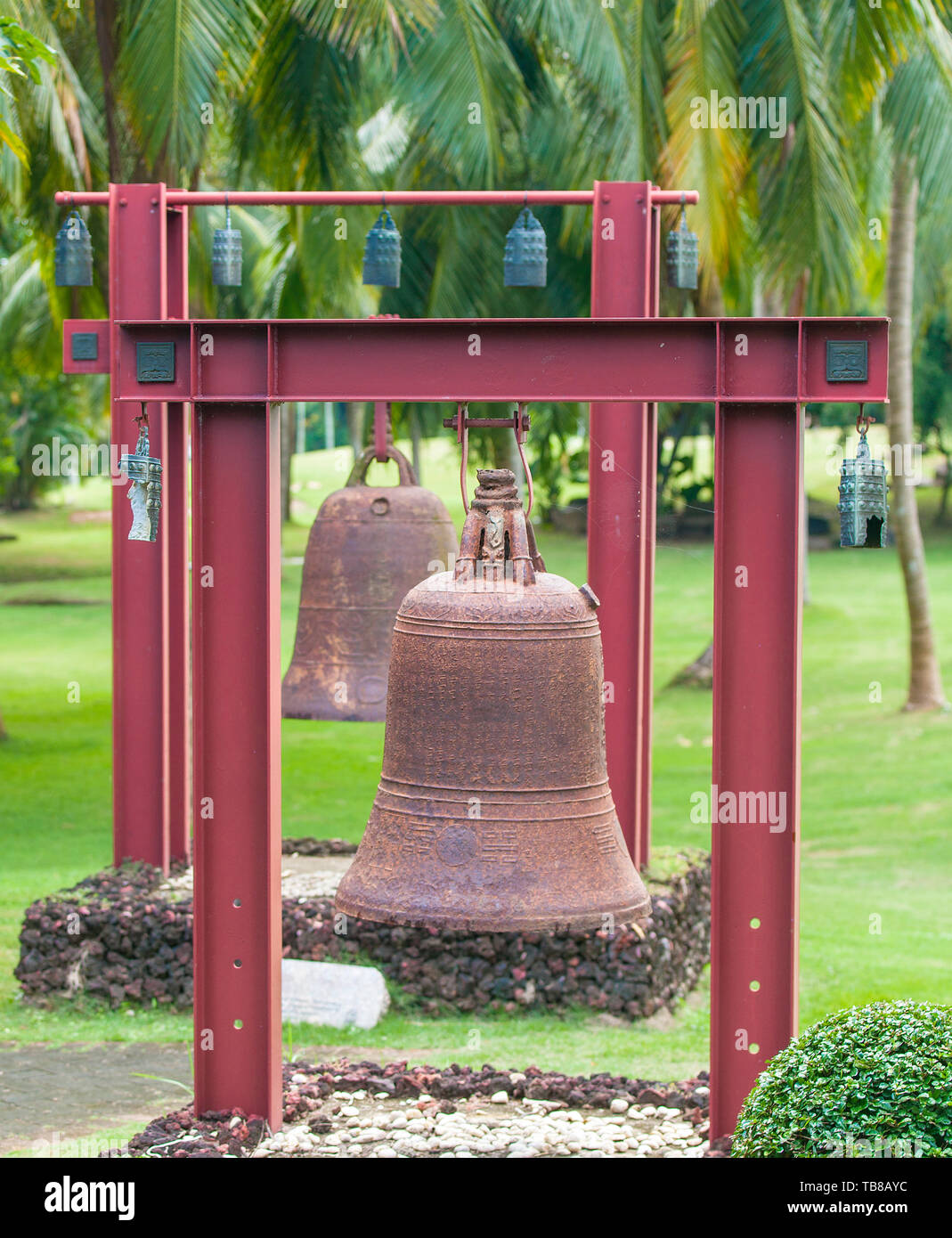 Square Bells in the center of Buddhism Nanshan on the island of Hainan in China. Stock Photo