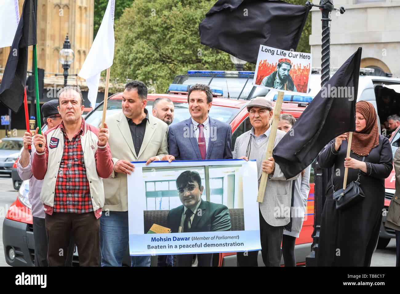 London, UK. 30th May, 2019. Protesters affiliated to the Pashtun Tahafuz Movement (PTM), many of the wearing Pashteen hats and traditional clothing, shout and protest against alleged violence and torture by Pakistani military and state forces against Pashtuns. Many Pashtuns are ethnic Afghans, living in Pakistan and Afghanistan. Credit: Imageplotter/Alamy Live News Stock Photo
