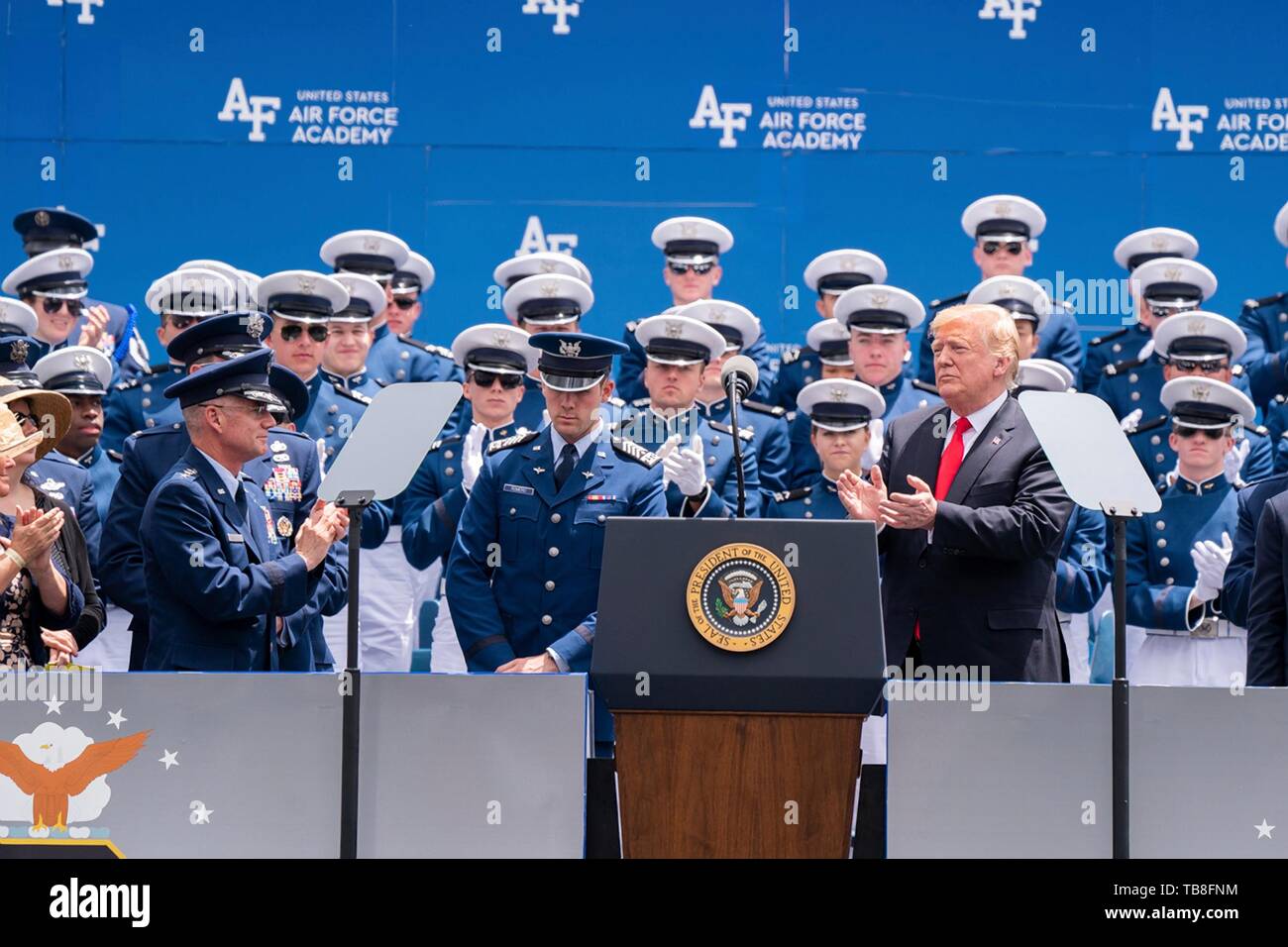 U.S President Donald Trump applauds after concluding his remarks at the U.S. Air Force Academy Graduation Ceremony at the USAF Academy Falcon Stadium May 30, 2019 in Colorado Springs, Colorado. Credit: Planetpix/Alamy Live News Stock Photo