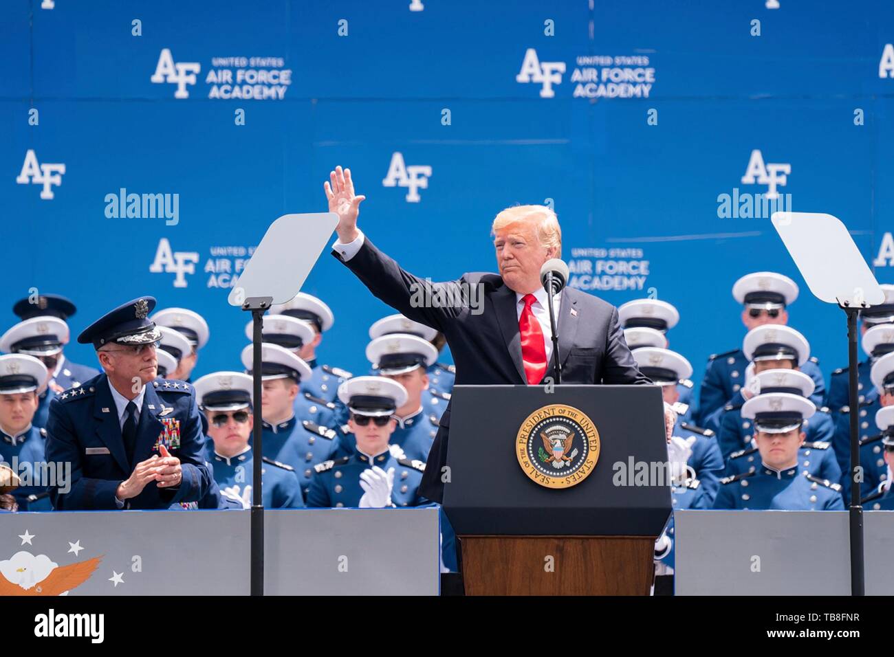 U.S President Donald Trump waves during his address at the U.S. Air Force Academy Graduation Ceremony at the USAF Academy Falcon Stadium May 30, 2019 in Colorado Springs, Colorado. Credit: Planetpix/Alamy Live News Stock Photo