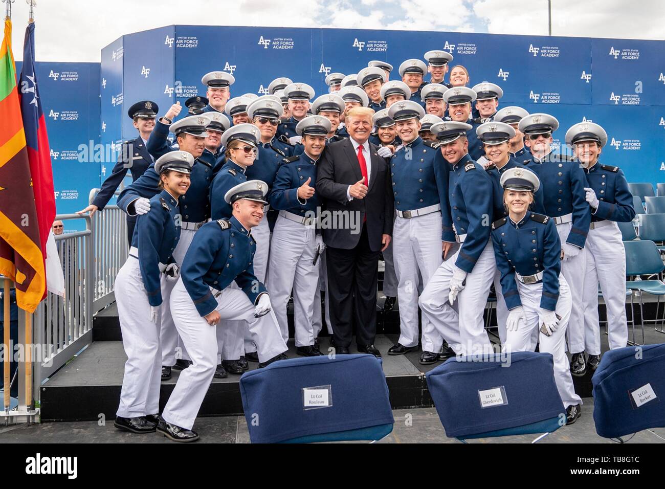 U.S President Donald Trump poses with a group of graduating cadets following the U.S. Air Force Academy Graduation Ceremony at the USAF Academy Falcon Stadium May 30, 2019 in Colorado Springs, Colorado. Credit: Planetpix/Alamy Live News Stock Photo
