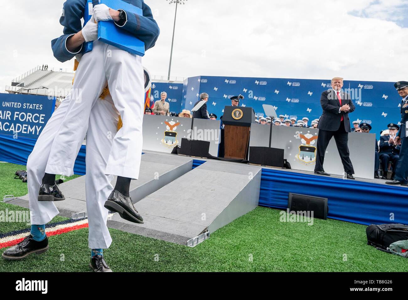 Cadets embrace after being congratulated by U.S President Donald Trump during the U.S. Air Force Academy Graduation Ceremony at the USAF Academy Falcon Stadium May 30, 2019 in Colorado Springs, Colorado. Credit: Planetpix/Alamy Live News Stock Photo