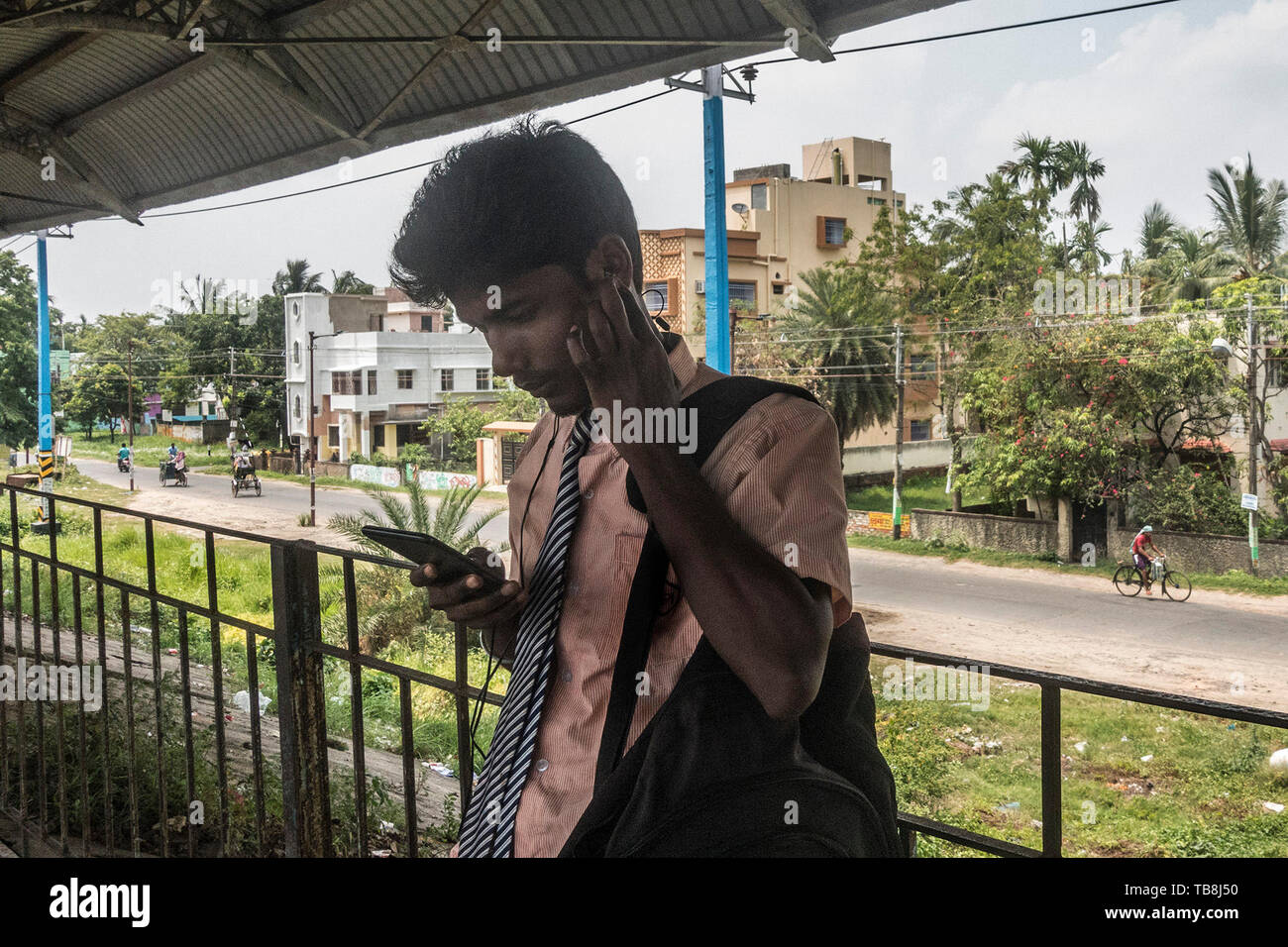 Kolkata. 30th May, 2019. A man checks mobile phone in Kolkata, India on May 30, 2019. Over years, fake news have emerged as a big challenge in India both for the government and the civil society, even as it led to violence and tension in the society, at times even killings. TO GO WITH Spotlight: Fake News in social media big challenge in India Credit: Tumpa Mondal/Xinhua/Alamy Live News Stock Photo