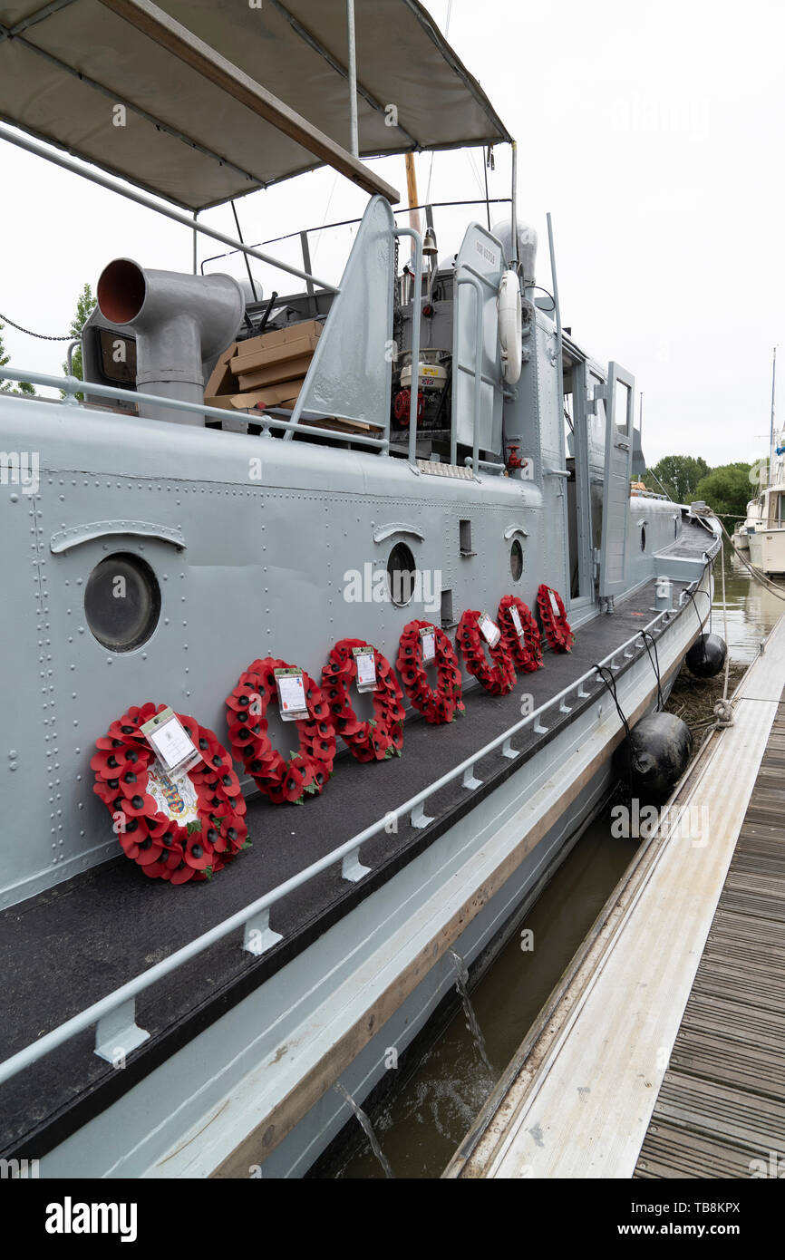 75th anniversary of D-Day. Six wreaths on the deck of P22, a former US built Rhine River Patrol Boat. Wraths displayed before been sailed to France. Stock Photo