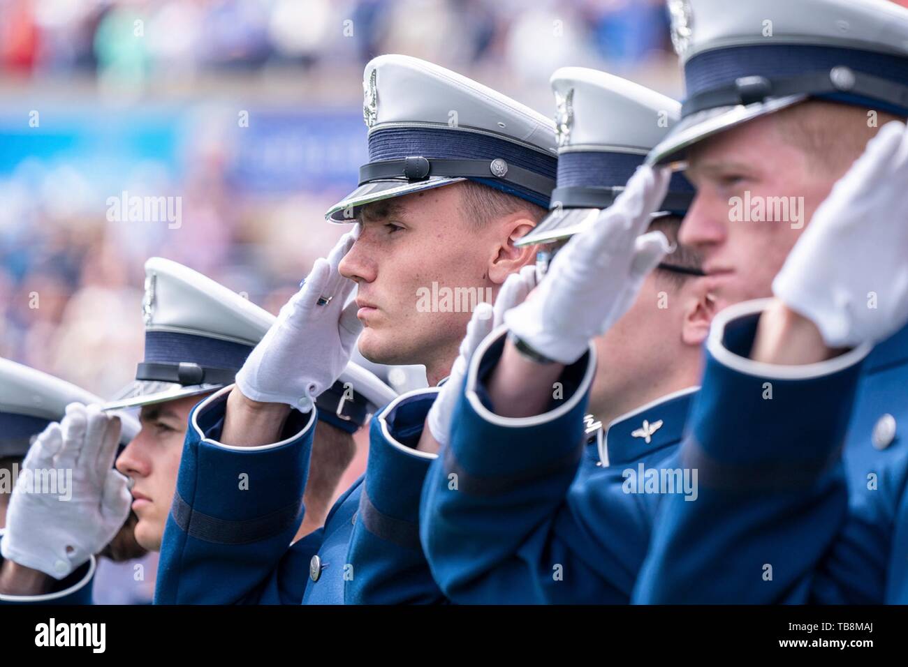 Colorado Springs, Colorado, USA. 30th May, 2019. U.S Air Force Academy cadets salute as they are commissioned during the Graduation Ceremony at the USAF Academy Falcon Stadium May 30, 2019 in Colorado Springs, Colorado. Credit: Planetpix/Alamy Live News Stock Photo