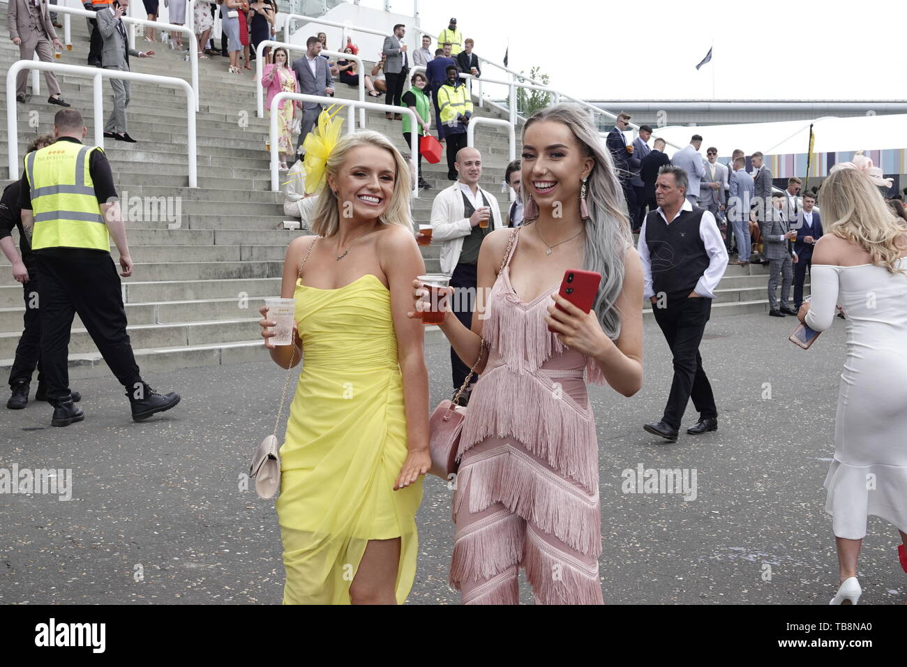Epsom Downs, Surrey, UK. 31st May, 2019. Atmospheric scenes of punters prior to the start of racing at the Investec Derby Festival - on Ladies Day, classic horse race. Credit: Motofoto/Alamy Live News Stock Photo