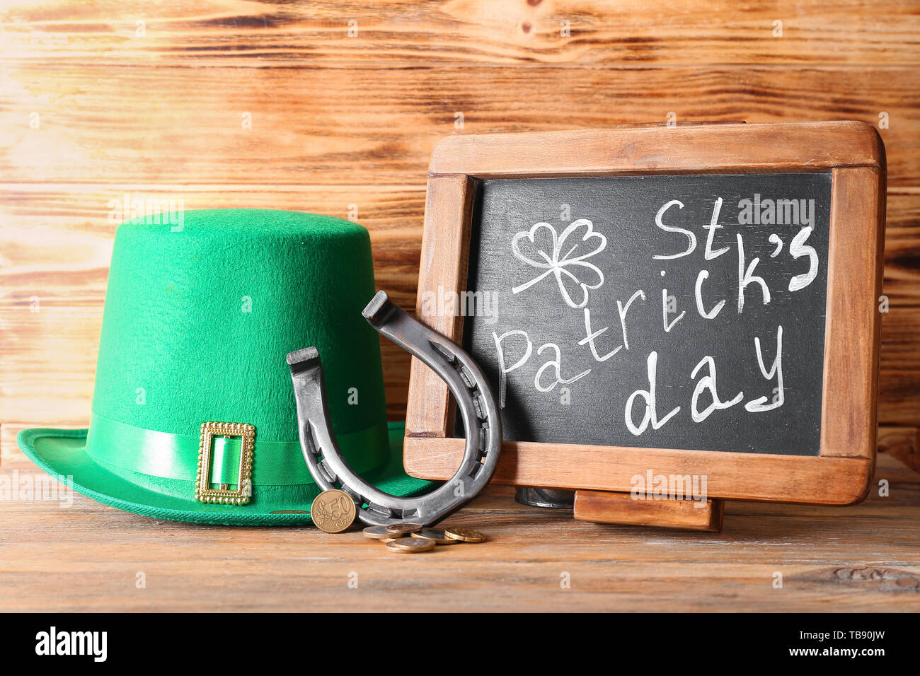 Chalkboard with text "St. Patrick's Day", horseshoe and leprechaun's