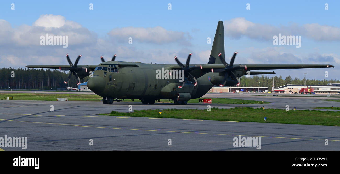 A Royal Air Force C-130J Hercules taxis after flight operations in support of Arctic Challenge Exercise 2019 at Kallax Air Base, Luleå, Sweden, May 29, 2019. ACE 19 is a Nordic aviation exercise that provides realistic, scenario-based training to prepare forces for enemy defensive systems. U.S. forces are engaged, postured and ready to deter and defend in an increasingly complex security environment. (U.S. Navy Photo by Chief Mass Communication Specialist John M. Hageman) Stock Photo