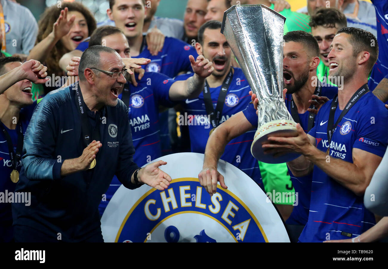 Chelsea's Gary Cahill and Chelsea manager Maurizio Sarri celebrate with the trophy after the UEFA Europa League final at The Olympic Stadium, Baku, Azerbaijan. PRESS ASSOCIATION Photo. Picture date: Wednesday May 29, 2019. See PA soccer Europa. Photo credit should read: Bradley Collyer/PA Wire Stock Photo