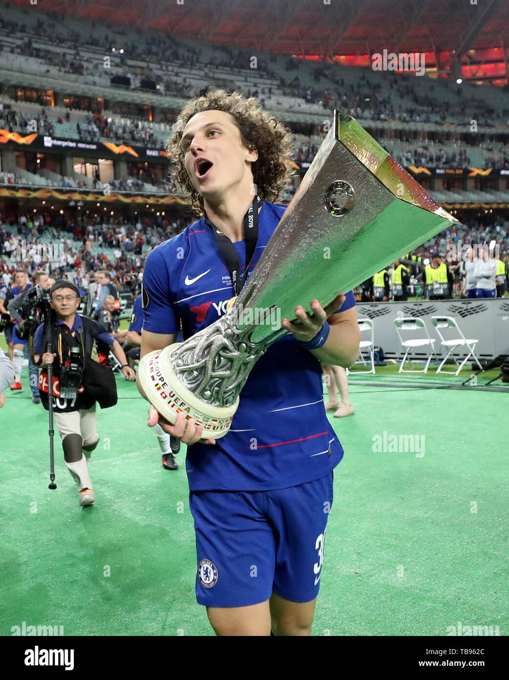 Chelsea's David Luiz celebrates with the trophy after the UEFA Europa League final at The Olympic Stadium, Baku, Azerbaijan. PRESS ASSOCIATION Photo. Picture date: Wednesday May 29, 2019. See PA SOCCER Europa. Photo credit should read: Bradley Collyer/PA Wire Stock Photo