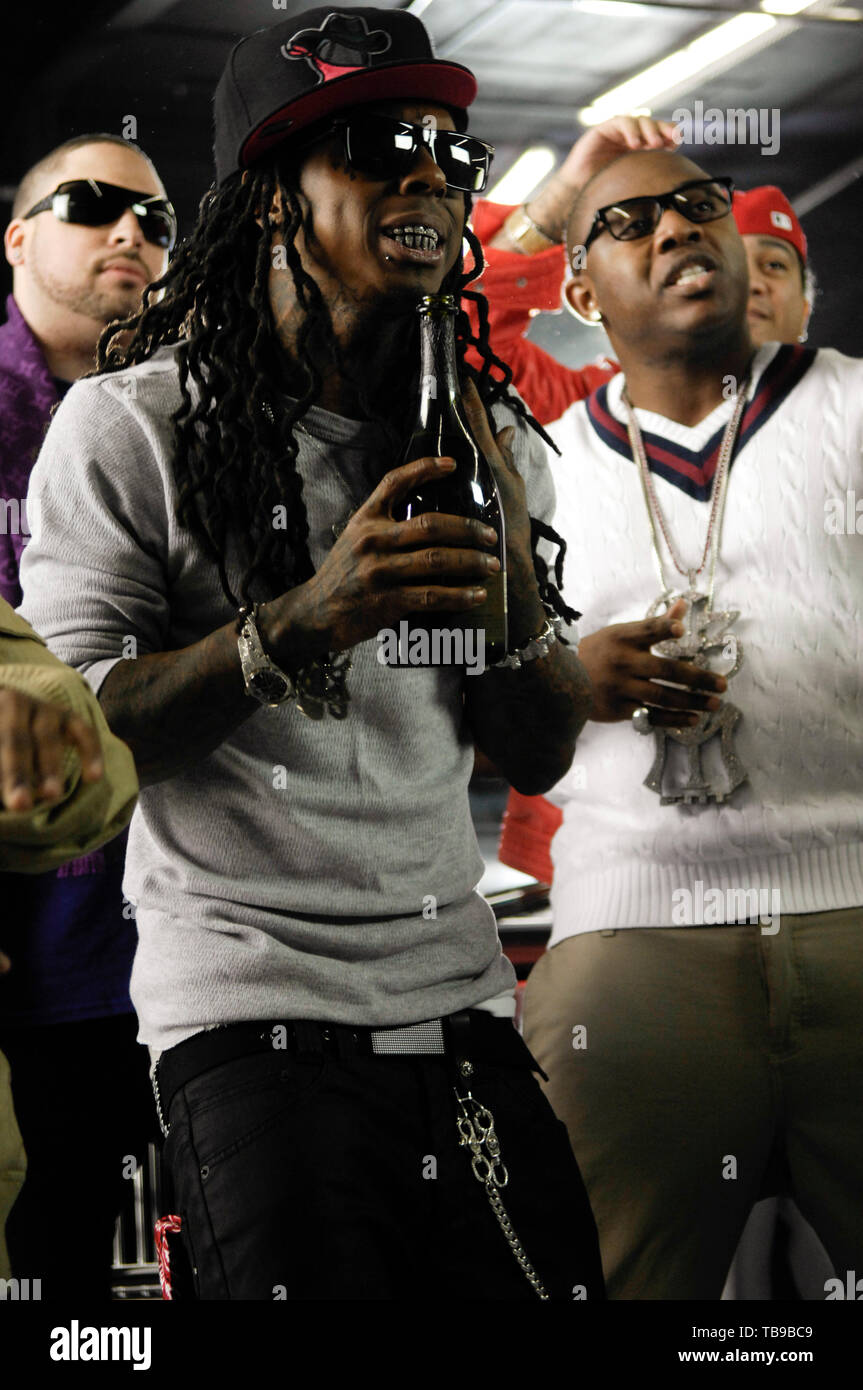(L-R) Rap Superstar Lil Wayne, Mack Maine and guest on the set of their music video with Young Money called 'Every Girl' filmed in Los Angeles, CA on February 14th, 2009. Stock Photo