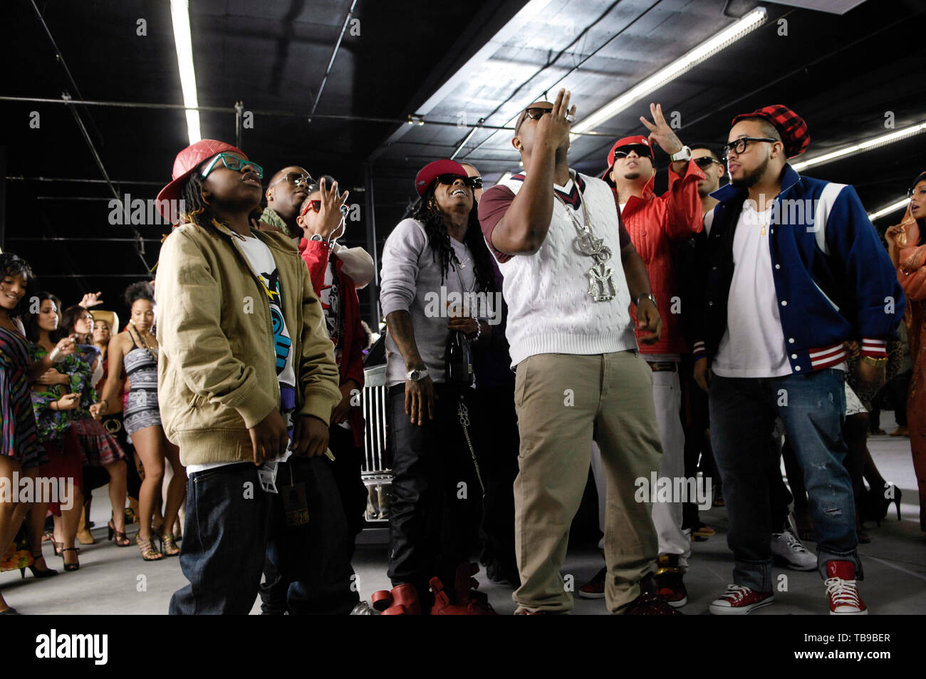 (L-R) Lil Chuckee, Rap Superstar Lil Wayne, Mack Maine and guest on the set of their music video with Young Money called 'Every Girl' filmed in Los Angeles, CA on February 14th, 2009. Stock Photo