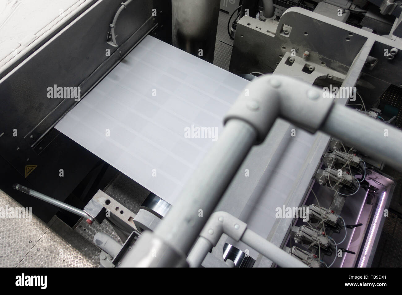 Printing Machine Running Web Blurrzy from Control Panel Booth Above Stock Photo