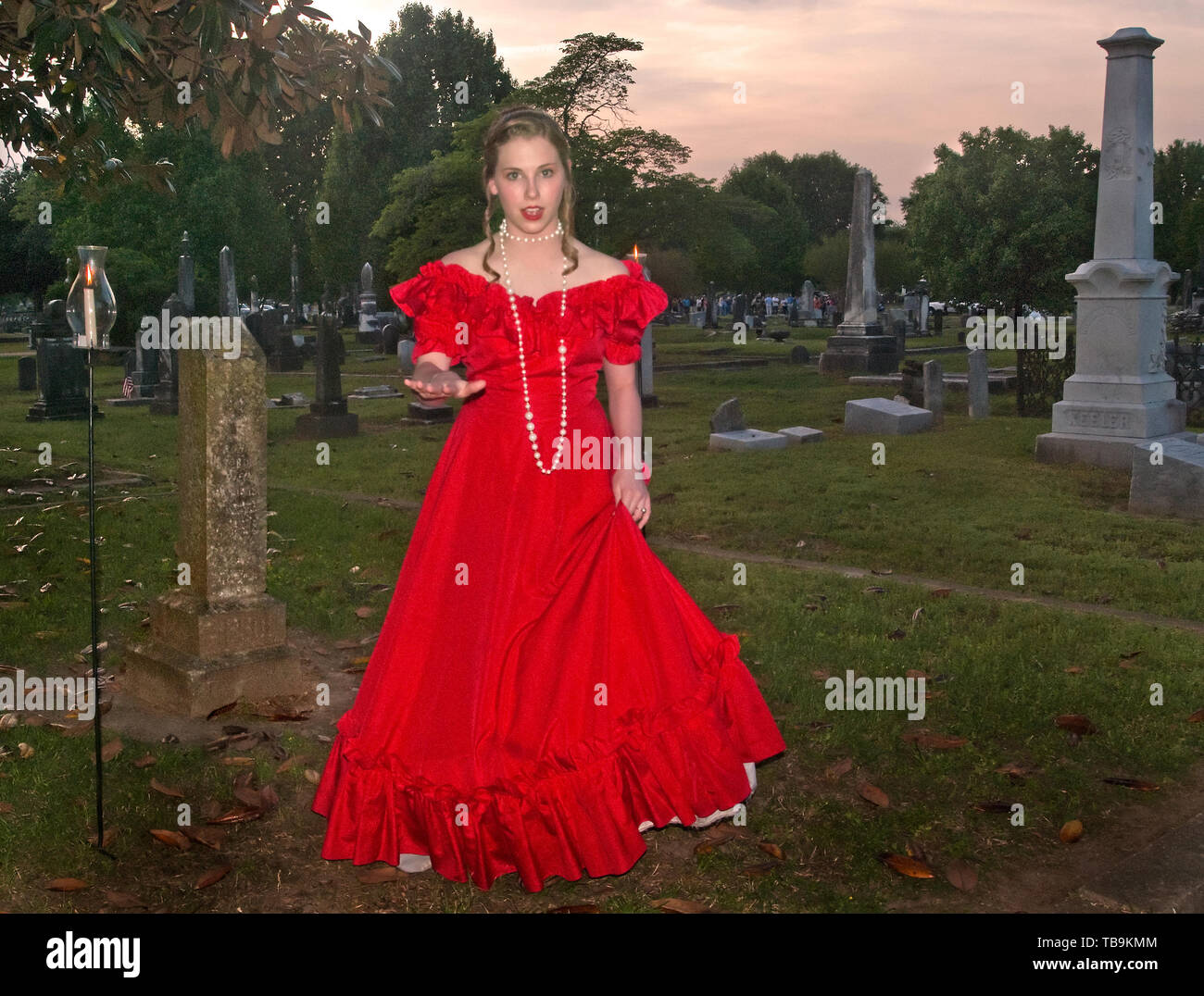 A teenager portrays a local character during 'Tales from the Crypt,' held at Friendship Cemetery in Columbus, Mississippi, April 16, 2010. Stock Photo