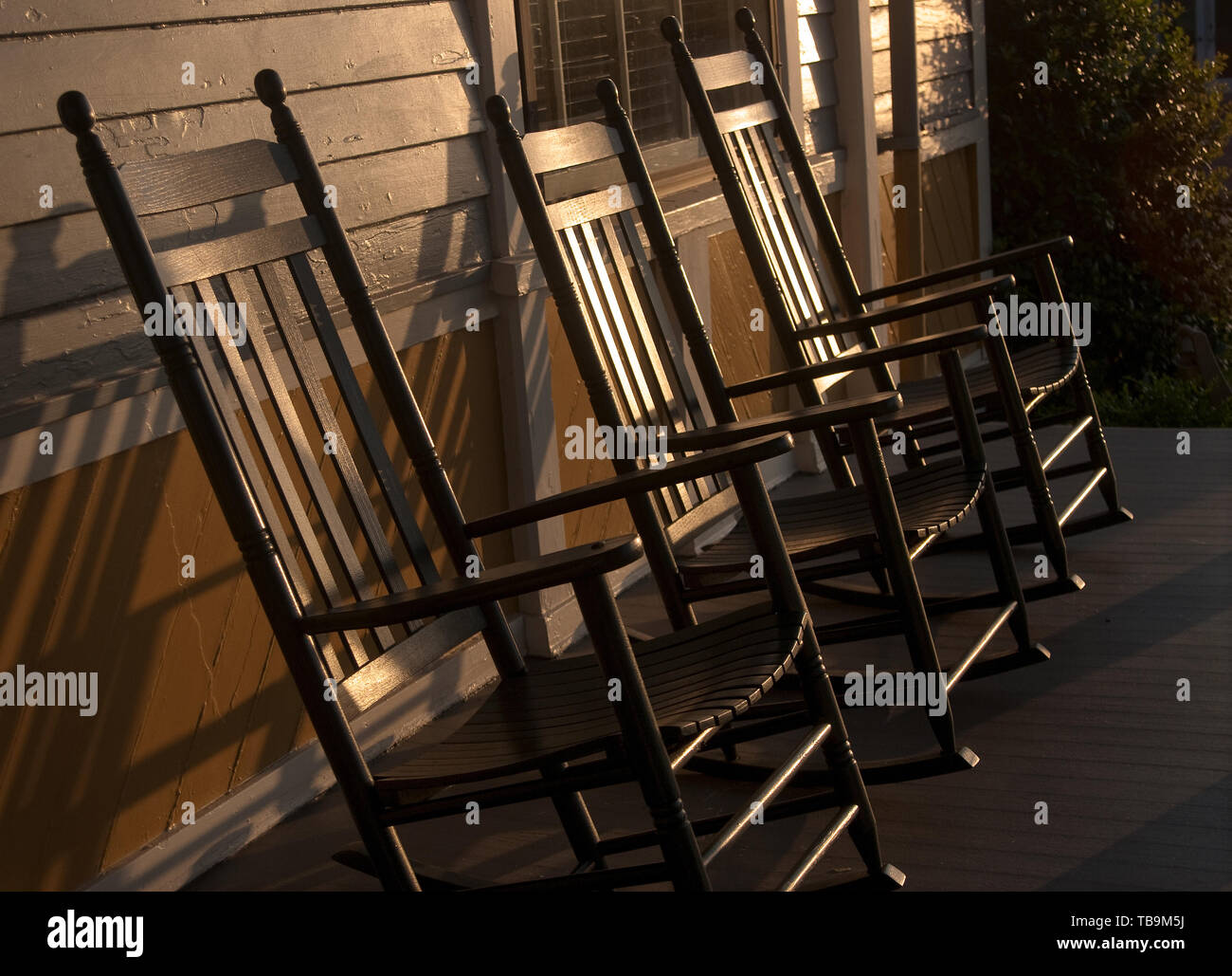 The Sun Sets On A Trio Of Rocking Chairs At Tennessee Williams