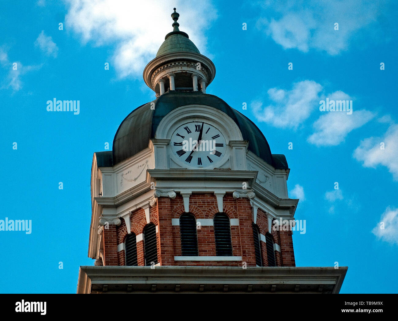 The clock tower of the Lowndes County Courthouse displays the time in