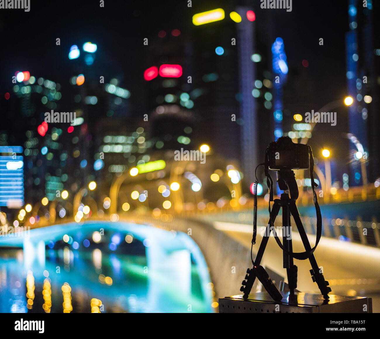 Camera and tripod on Jubilee Bridge on the Golden Jubilee Bridge