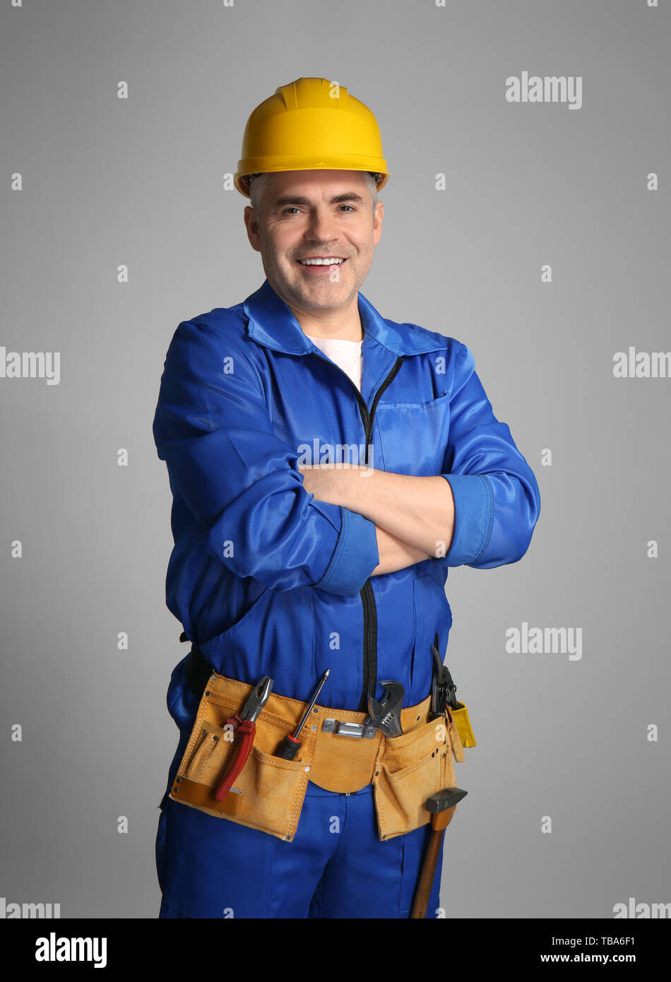 Mature worker in uniform hi-res stock photography and images - Alamy