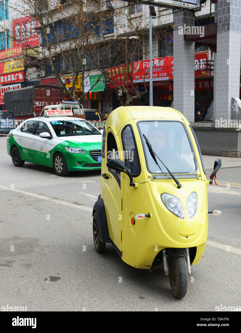 A covered Three wheeler vehicle in Kaili, Guizhou. Stock Photo
