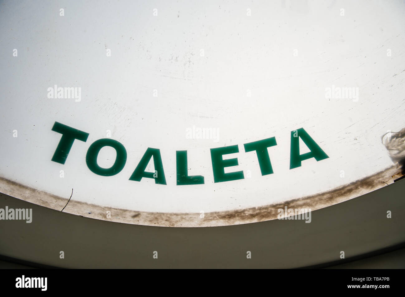 Toilet toaleta sign in Herestrau park in central Bucharest - sign to public WC Stock Photo