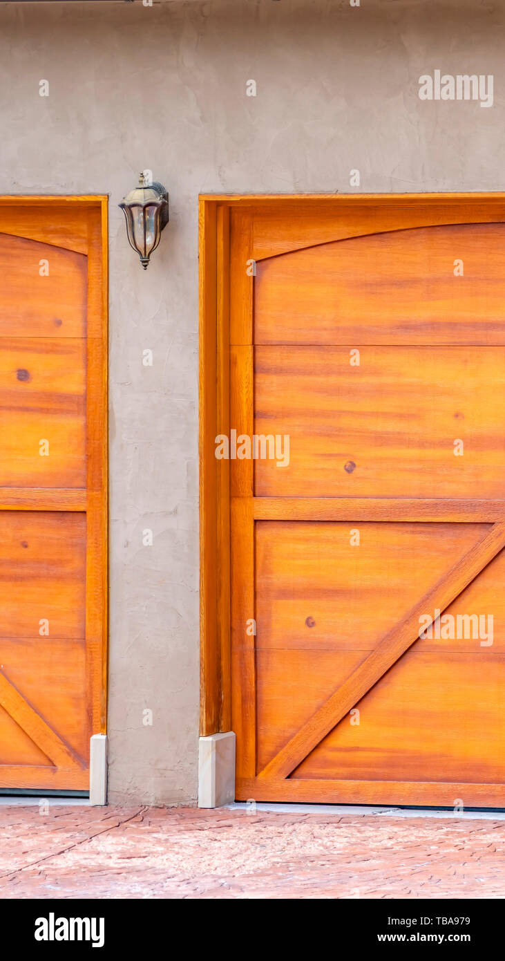 Frame Vertical Close Up View Of The Brown Wooden Garage Door At
