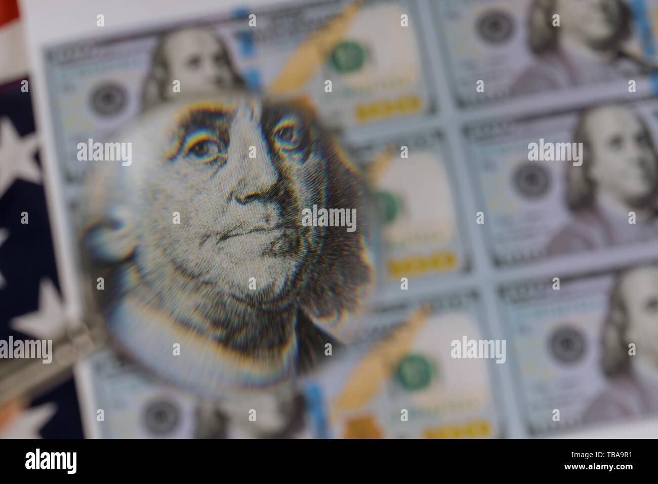 magnifying-glass-for-benjamin-franklin-on-hundred-us-dollars-bill-TBA9R1.jpg