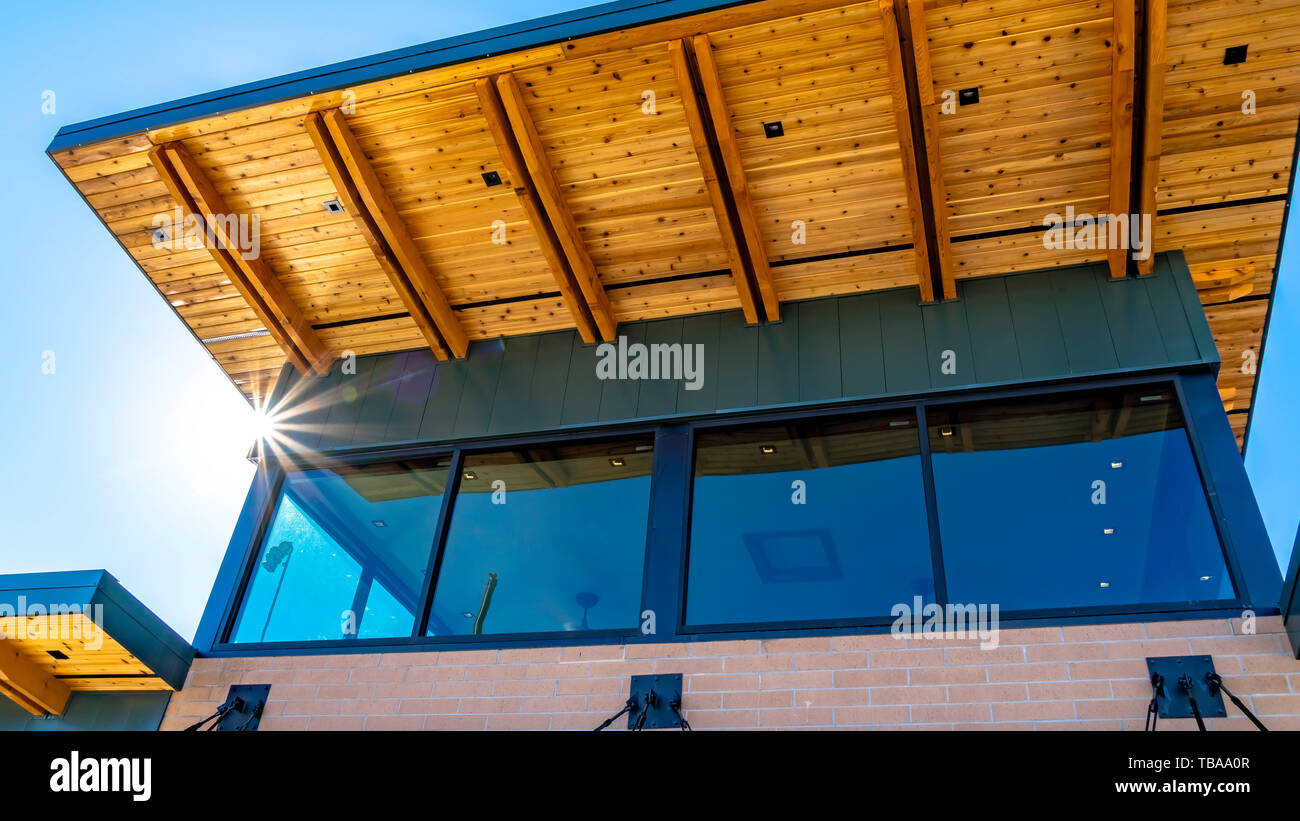 Panorama Exterior of a building with flat roof and classic red brick ...