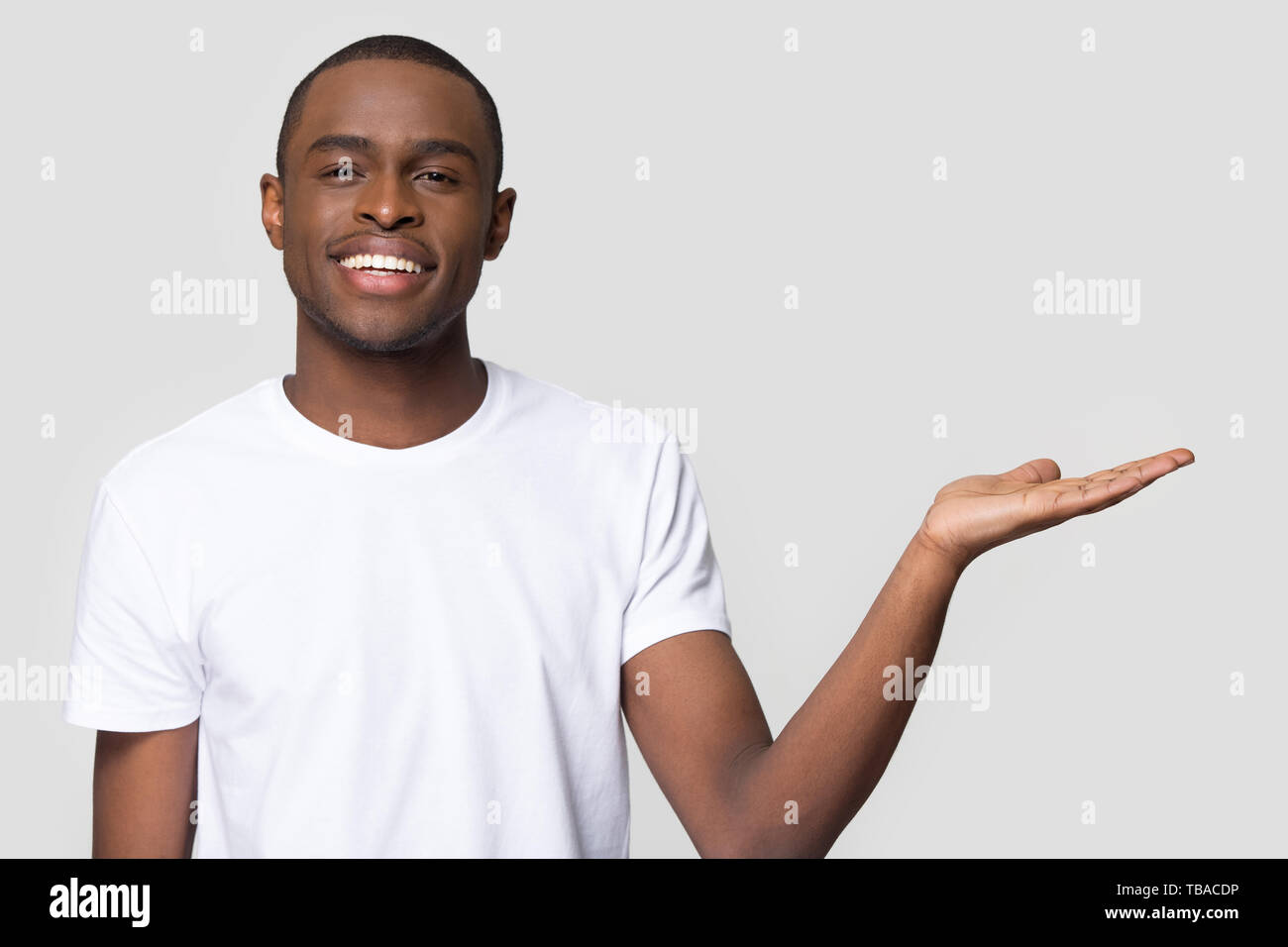 Headshot portrait african male advertise product studio shot Stock Photo