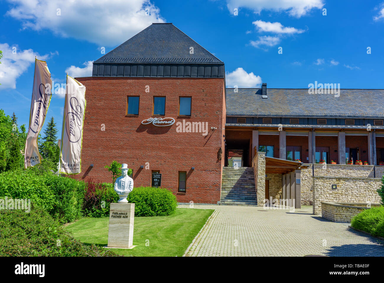 Herend, HUNGARY, - 05.25. 2019: Herend Porcelain Manufacture building from outside, specializing in luxury hand painted and gilded porcelain. Founded  Stock Photo