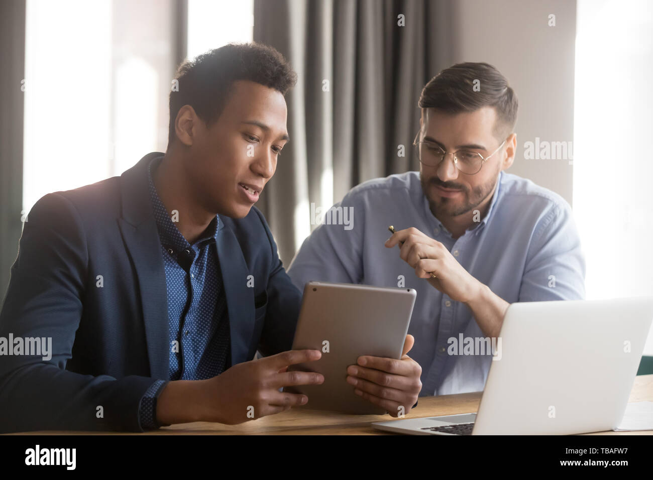Diverse male colleagues hi-res stock photography and images - Alamy