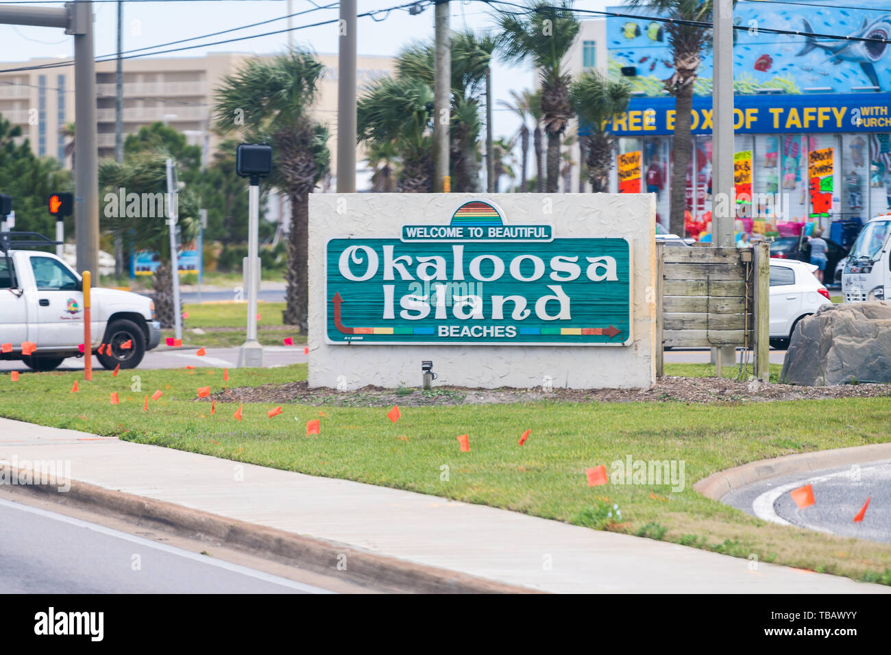 Fort Walton Beach, USA - April 24, 2018: Welcome to Beautiful Okaloosa Island beaches road sign in Emerald Coast city, Gulf of Mexico in Florida panha Stock Photo